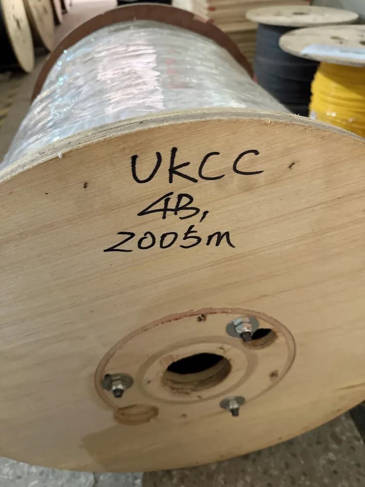 UKCC cable drum with identification and length marking, shown as a traceability example rather than evidence of site acceptance